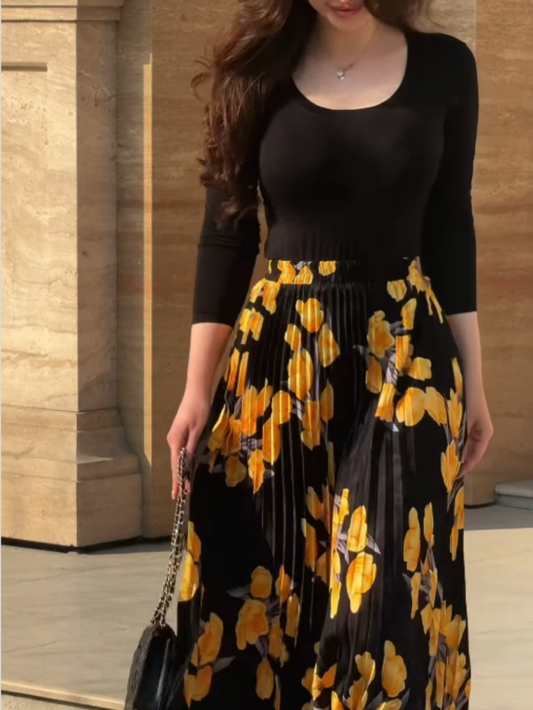 Pleated yellow printed skirt